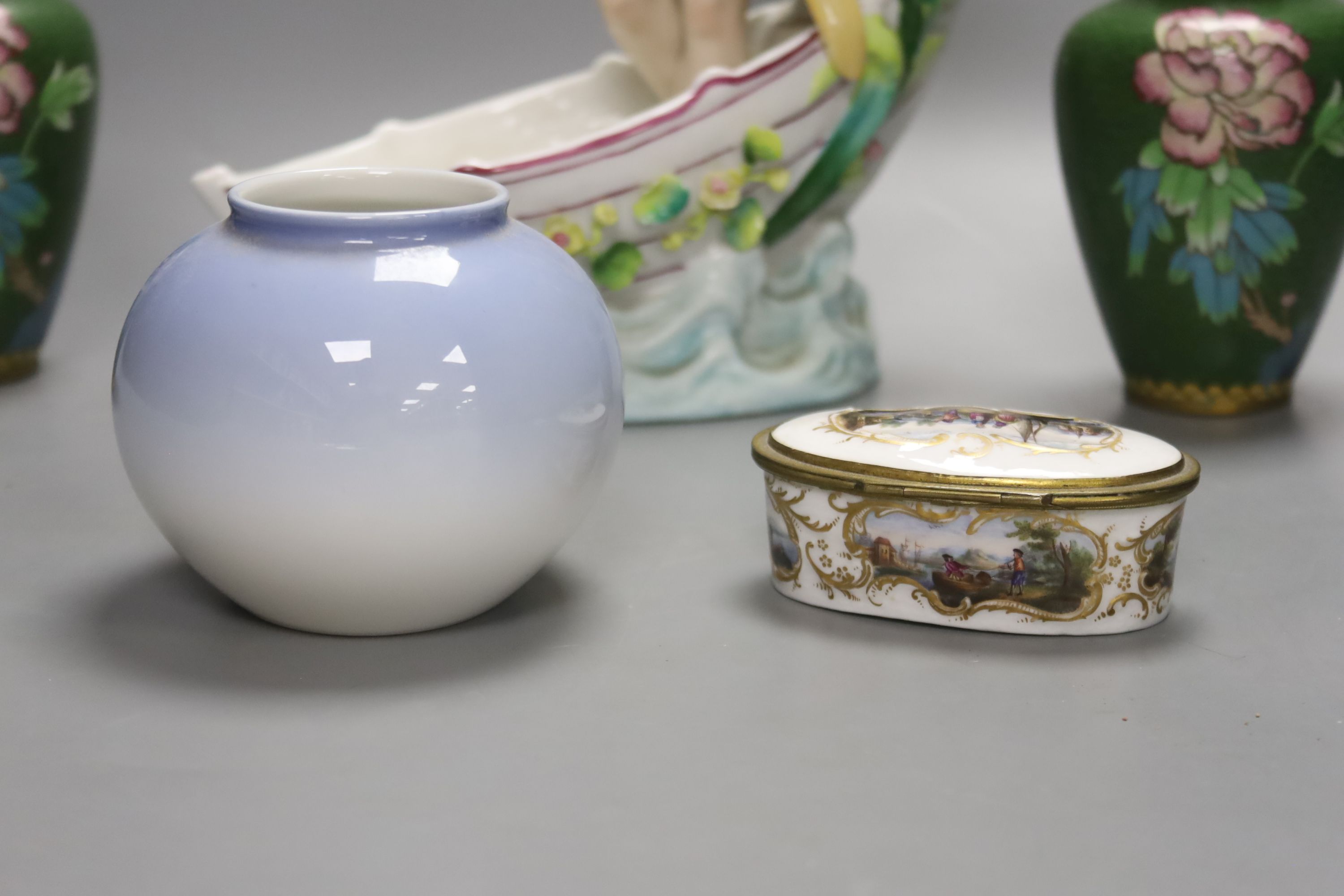 A Meissen style porcelain trinket box, a Royal Copenhagen vase, 9cm high, a cherub vase, 25cm high, and a pair of Chinese cloisonne enamel vases, 13cm high